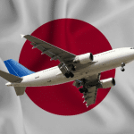 Airplane in front of the Japanese flag